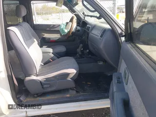 2000 Toyota Tacoma with VIN 5TEWN72N1YZ690947, listed as a IAAI auction lot 41951521 with 207,119 mi miles and . Bid and sale history available at DreamBid. Image 5.
