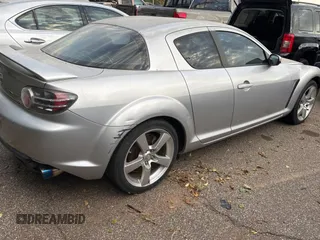 2004 Mazda RX-8 with VIN JM1FE17N540130784, listed as a Copart auction lot 76628734 with 122,806 mi miles and Clean Title. Bid and sale history available at carsss.com. Image 4.