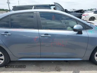 2023 Toyota Corolla LE z VIN 5YFB4MDE0PP073153, wystawiony jako IAAI lot #42279873 z przebiegiem 5 958 mil mil oraz . Historia ofert i sprzedaży dostępna na DreamBid. Obrazek 14.