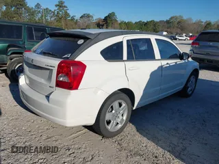 2009 Dodge Caliber SXT with VIN 1B3HB48A39D233105, listed as a IAAI auction lot 41872576 with Not Provided miles and . Bid and sale history available at DreamBid. Image 4.