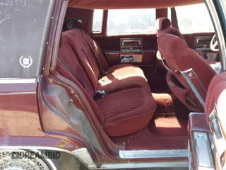 1991 Cadillac Brougham z VIN 1G6DW54E4MR716777, wystawiony jako IAAI lot #42383965 z przebiegiem 197 824 mil mil oraz . Historia ofert i sprzedaży dostępna na DreamBid. Obrazek 8.