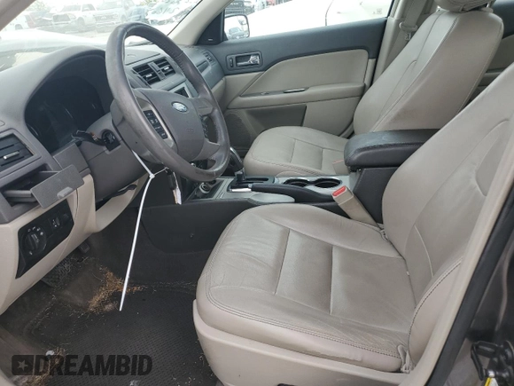 2012 Ford Fusion SEL z VIN 3FAHP0JA5CR396457, wystawiony jako Copart lot #53291475 z przebiegiem Nie podano mil oraz Szkoda całkowita • Salvage title. Historia ofert i sprzedaży dostępna na DreamBid. Obrazek 7.