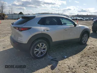 2023 Mazda CX-30 S Premium with VIN 3MVDMBDM6PM525178, listed as a Copart auction lot 54330005 with 21,670 mi miles and Salvage title. Bid and sale history available at DreamBid. Image 3.