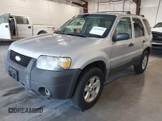 2006 Ford Escape XLT with VIN 1FMCU93126KC12711, listed as a IAAI auction lot 42659618 with 180,611 mi miles and . Bid and sale history available at DreamBid. Image 2.