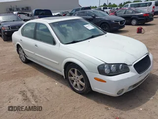 2002 Nissan Maxima GLE z VIN JN1DA31AX2T313083, wystawiony jako IAAI lot #42040751 z przebiegiem 182 814 mil mil oraz . Historia ofert i sprzedaży dostępna na DreamBid. Obrazek 1.