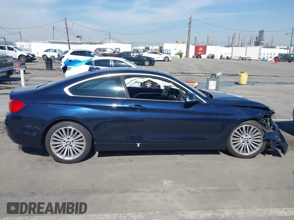 2016 BMW 4 Series 428i with VIN WBA3N7C59GK227052, listed as a IAAI auction lot 41643344 with 69,503 mi miles and . Bid and sale history available at carsss.com. Image 12.