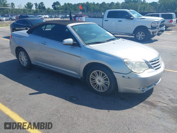 2009 Chrysler Sebring Touring with VIN 1C3LC55D99N574422, listed as a IAAI auction lot 42595676 with 141,603 mi miles and . Bid and sale history available at DreamBid. Image 1.