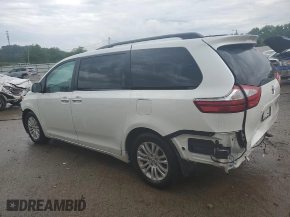 2015 Toyota Sienna XLE with VIN 5TDYK3DC6FS630405, listed as a Copart auction lot 59872045 with 60,306 mi miles and Salvage title. Bid and sale history available at DreamBid. Image 2.
