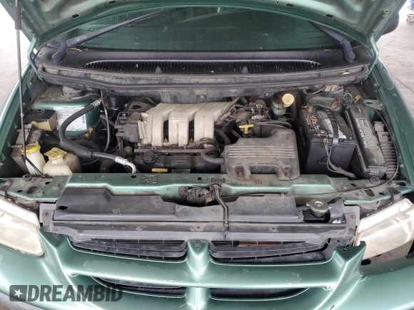 1999 Dodge Caravan with VIN 2B4GP25R8XR200747, listed as a Copart auction lot 58273225 with 182,147 mi miles and Salvage title. Bid and sale history available at DreamBid. Image 12.