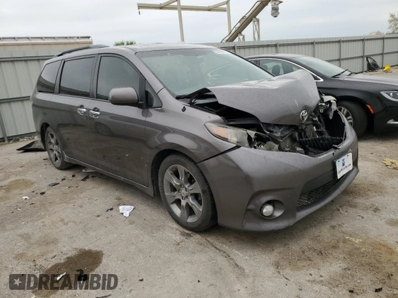 2014 Toyota Sienna SE с VIN 5TDXK3DC1ES519741, выставлен на аукционе Copart как лот 53892035 с пробегом Не указан миль и Списание • Salvage title. История ставок и продаж доступна на DreamBid. Изображение 4.