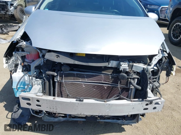 2015 Toyota Prius Four with VIN JTDKN3DUXF1885268, listed as a IAAI auction lot 42087198 with 98,482 mi miles. Bid and sale history available at carsss.com. Image 6.