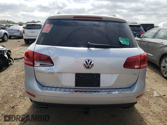 2012 Volkswagen Touareg Exec with VIN WVGEF9BP9CD009937, listed as a Copart auction lot 59622944 with Not Provided miles and Clean Title. Bid and sale history available at DreamBid. Image 6.