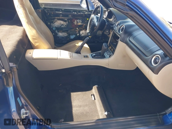 2003 Mazda MX-5 Miata Cloth z VIN JM1NB353830301964, wystawiony jako IAAI lot #42317534 z przebiegiem 192 342 mil mil oraz . Historia ofert i sprzedaży dostępna na DreamBid. Obrazek 5.
