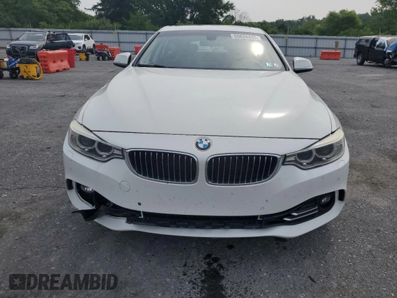 2015 BMW 4 Series 428i xDrive с VIN WBA4C9C52FD330306, выставлен на аукционе Copart как лот 60834435 с пробегом 167 034 миль миль и Списание • Salvage title. История ставок и продаж доступна на DreamBid. Изображение 5.