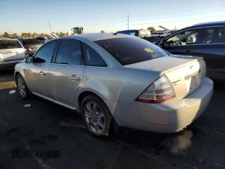 2009 Ford Taurus Limited with VIN 1FAHP25W89G101188, listed as a Copart auction lot 77220984 with 149,142 mi miles and Salvage Title. Bid and sale history available at carsss.com. Image 2.