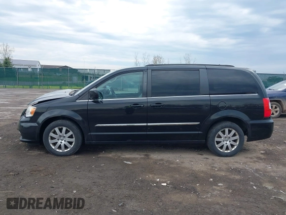 2014 Chrysler Town & Country Touring with VIN 2C4RC1BG7ER449297, listed as a IAAI auction lot 42113170 with 195,878 mi miles and . Bid and sale history available at DreamBid. Image 14.