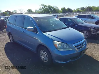 2007 Honda Odyssey EX-L with VIN 5FNRL38707B051950, listed as a IAAI auction lot 42175286 with 125,818 mi miles. Bid and sale history available at carsss.com. Image 1.