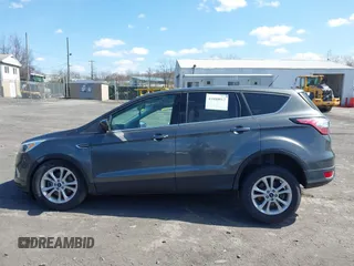 2017 Ford Escape SE with VIN 1FMCU9GD5HUC17297, listed as a IAAI auction lot 41880013 with 57,737 mi miles and . Bid and sale history available at DreamBid. Image 14.
