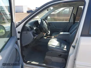 2001 Mercedes-Benz M-Class with VIN 4JGAB54E01A257846, listed as a IAAI auction lot 42010998 with 194,597 mi miles. Bid and sale history available at carsss.com. Image 5.