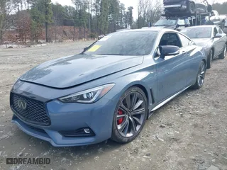 2021 Infiniti Q60 RED SPORT 400 with VIN JN1FV7LKXMM530401, listed as a IAAI auction lot 41409153 with 31,247 mi miles. Bid and sale history available at carsss.com. Image 2.