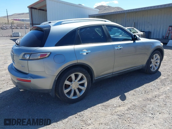 2005 Infiniti FX z VIN JNRAS08W45X218545, wystawiony jako IAAI lot #41904209 z przebiegiem 223 649 mil mil oraz . Historia ofert i sprzedaży dostępna na DreamBid. Obrazek 4.