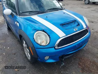 2010 MINI Hardtop S with VIN WMWMF7C55ATW88946, listed as a IAAI auction lot 42443200 with 104,953 mi miles and . Bid and sale history available at DreamBid. Image 6.