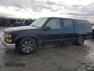 1996 Chevrolet Suburban with VIN 3GNEC16R9TG167845, listed as a Copart auction lot 80119734 with 414,794 mi miles and Salvage title. Bid and sale history available at DreamBid. Image 1.