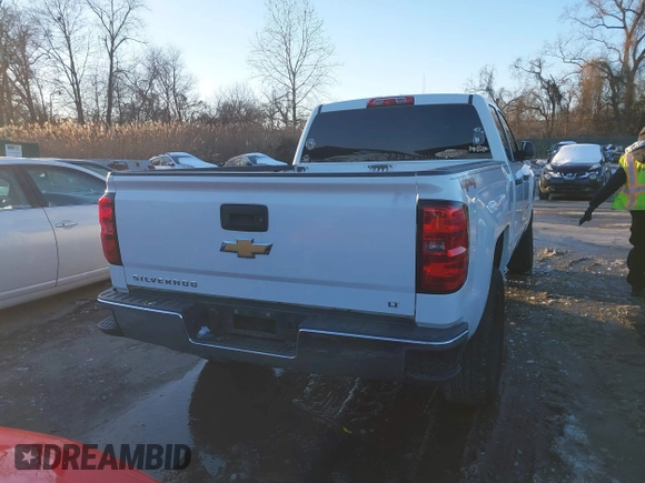 2014 Chevrolet Silverado 1500 LT with VIN 1GCVKREH4EZ148979, listed as a IAAI auction lot 41215714 with 193,710 mi miles and . Bid and sale history available at DreamBid. Image 16.