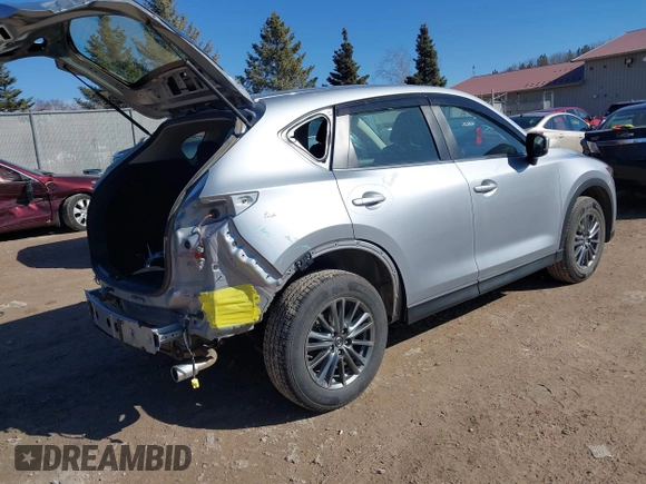 2018 Mazda CX-5 Sport with VIN JM3KFBBM6J0336683, listed as a IAAI auction lot 41737817 with 94,881 mi miles. Bid and sale history available at carsss.com. Image 4.