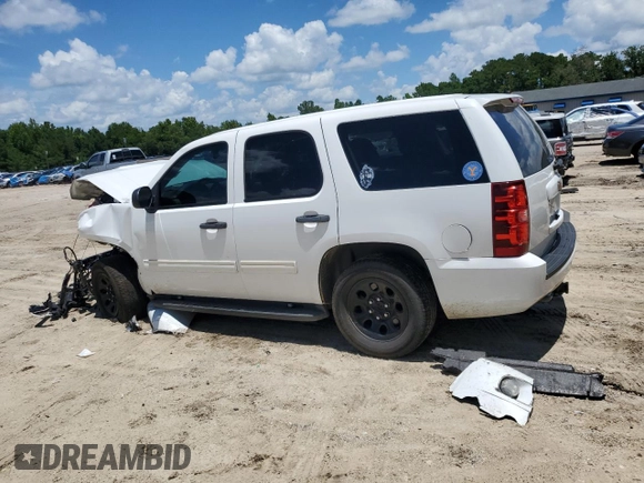 2014 Chevrolet Tahoe Commercial with VIN 1GNLC2E04ER202441, listed as a Copart auction lot 61310725 with 117,443 mi miles and Salvage title. Bid and sale history available at DreamBid. Image 2.