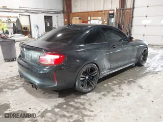 2018 BMW M2 with VIN WBS1J5C56JVD36919, listed as a IAAI auction lot 41587121 with 46,356 mi miles. Bid and sale history available at carsss.com. Image 4.