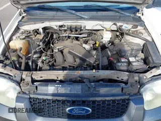 2006 Ford Escape XLT with VIN 1FMCU03116KA05836, listed as a IAAI auction lot 42310284 with 128,620 mi miles and . Bid and sale history available at DreamBid. Image 10.