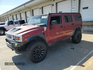 2003 Hummer H2 z VIN 5GRGN23UX3H127305, wystawiony jako Copart lot #53029185 z przebiegiem 147 465 mil mil oraz Szkoda całkowita • Salvage title. Historia ofert i sprzedaży dostępna na DreamBid. Obrazek 1.