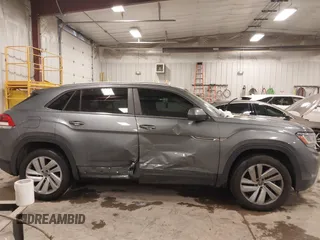 2020 Volkswagen Atlas SE with VIN 1V26E2CA9LC230374, listed as a IAAI auction lot 41336609 with 52,500 mi miles and . Bid and sale history available at DreamBid. Image 13.