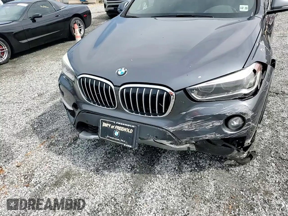 2016 BMW X1 xDrive28i z VIN WBXHT3C37GP888364, wystawiony jako Copart lot #53644975 z przebiegiem 119 725 mil mil oraz Szkoda całkowita • Salvage title. Historia ofert i sprzedaży dostępna na DreamBid. Obrazek 14.