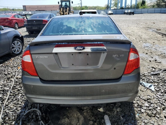 2012 Ford Fusion SEL z VIN 3FAHP0JA2CR293240, wystawiony jako Copart lot #54842035 z przebiegiem 236 208 mil mil oraz Szkoda całkowita • Salvage title. Historia ofert i sprzedaży dostępna na DreamBid. Obrazek 6.