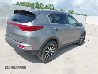 2017 Kia Sportage EX with VIN KNDPN3AC7H7083648, listed as a IAAI auction lot 42464382 with 200,167 mi miles and . Bid and sale history available at DreamBid. Image 4.