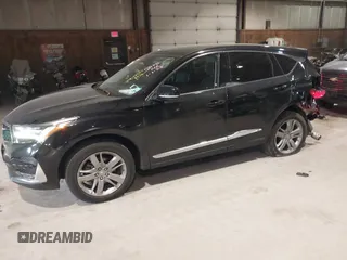 2021 Acura RDX w/Advance Package with VIN 5J8TC2H7XML030078, listed as a IAAI auction lot 41320663 with 74,478 mi miles. Bid and sale history available at carsss.com. Image 2.
