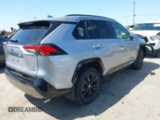 2022 Toyota RAV4 Hybrid SE with VIN JTM16RFV7ND062263, listed as a IAAI auction lot 42068485 with 25,282 mi miles and . Bid and sale history available at DreamBid. Image 4.