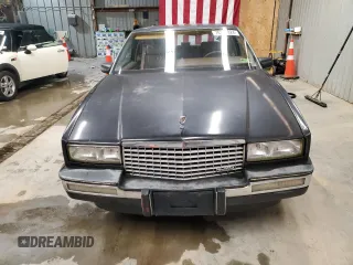 1988 Cadillac Eldorado z VIN 1G6EL1154JU615807, wystawiony jako Copart lot #76362924 z przebiegiem Nie podano mil oraz Tytuł czysty. Historia ofert i sprzedaży dostępna na DreamBid. Obrazek 5.