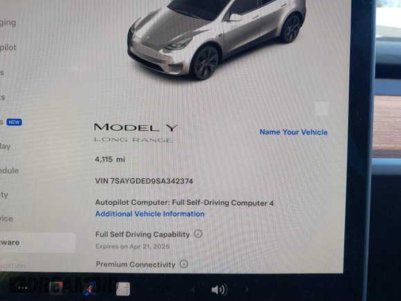 2025 Tesla Model Y Long Range with VIN 7SAYGDED9SA342374, listed as a IAAI auction lot 41663085 with 4,115 mi miles and . Bid and sale history available at DreamBid. Image 7.