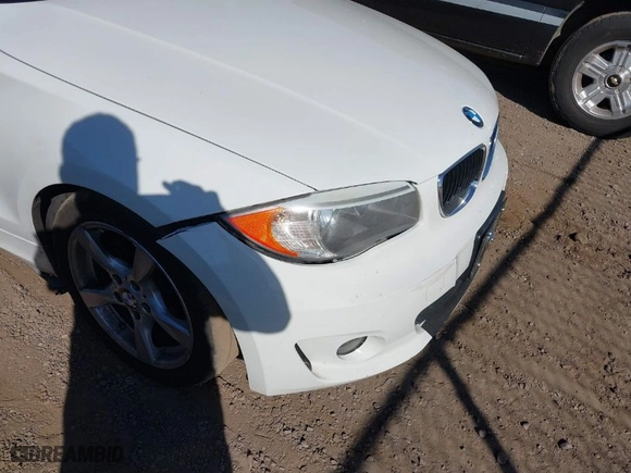 2013 BMW 1 Series 128i with VIN WBAUN1C55DVR01404, listed as a IAAI auction lot 41682695 with 100,948 mi miles. Bid and sale history available at carsss.com. Image 6.