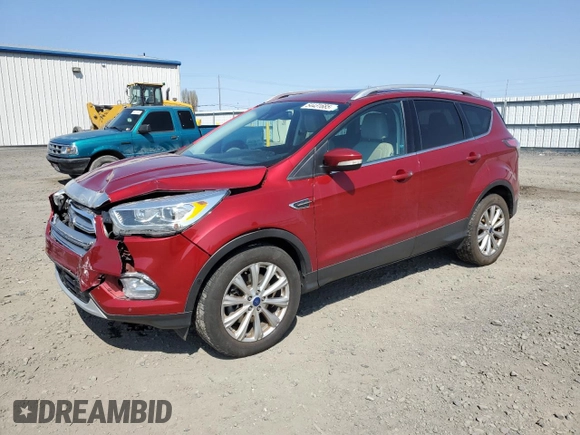 2017 Ford Escape Titanium with VIN 1FMCU9JD6HUB14799, listed as a Copart auction lot 54431685 with 75,454 mi miles and Salvage Title. Bid and sale history available at carsss.com. Image 1.