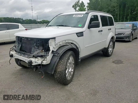 2011 Dodge Nitro Heat z VIN 1D4PU4GK9BW529192, wystawiony jako Copart lot #58587275 z przebiegiem 101 538 mil mil oraz Szkoda całkowita • Salvage title. Historia ofert i sprzedaży dostępna na DreamBid. Obrazek 14.