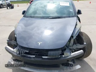 2023 Tesla Model 3 with VIN 5YJ3E1EA7PF417293, listed as a IAAI auction lot 42407659 with 22,578 mi miles and . Bid and sale history available at DreamBid. Image 10.