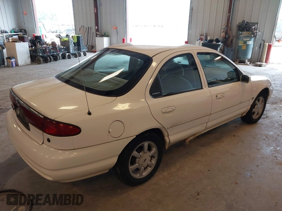 1999 Ford Contour SE z VIN 1FAFP6634XK138025, wystawiony jako IAAI lot #42436185 z przebiegiem 90 226 mil mil oraz . Historia ofert i sprzedaży dostępna na DreamBid. Obrazek 4.
