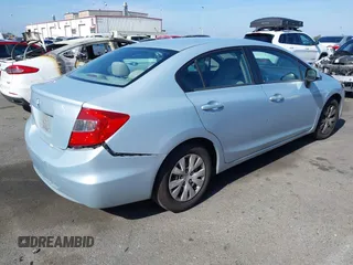 2012 Honda Civic LX with VIN 2HGFB2F58CH560126, listed as a IAAI auction lot 42097094 with 149,921 mi miles and . Bid and sale history available at DreamBid. Image 4.