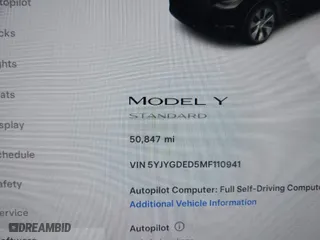 2021 Tesla Model Y Standard Range with VIN 5YJYGDED5MF110941, listed as a IAAI auction lot 41538640 with 50,847 mi miles. Bid and sale history available at carsss.com. Image 7.