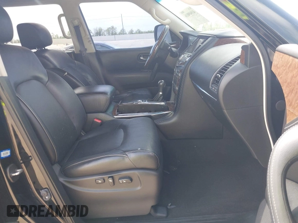 2015 Infiniti QX80 with VIN JN8AZ2ND1F9770203, listed as a IAAI auction lot 41949816 with 213,836 mi miles and . Bid and sale history available at DreamBid. Image 5.
