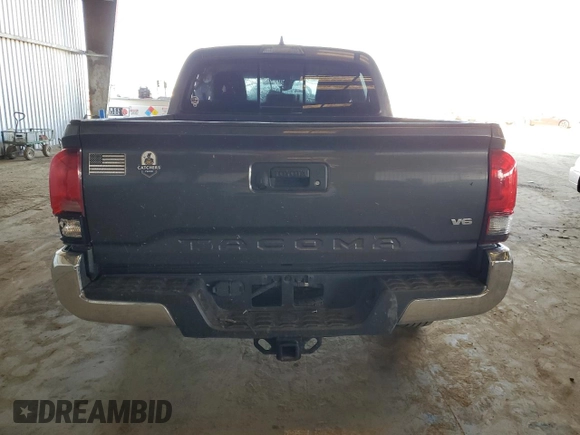 2018 Toyota Tacoma SR5 with VIN 3TMAZ5CN9JM075289, listed as a Copart auction lot 52409365 with 65,793 mi miles and Salvage Title. Bid and sale history available at DreamBid. Image 6.